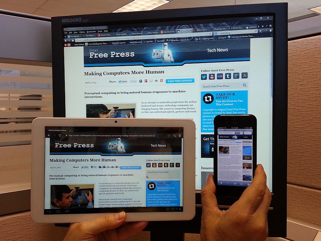 Responsive website displayed on desktop, tablet, and phone screens